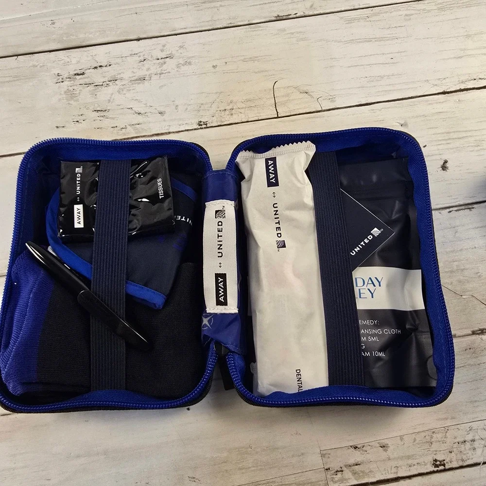 NEW Away United Airlines Amenity Kit Navy Blue Hard Shell Case Sunday Riley